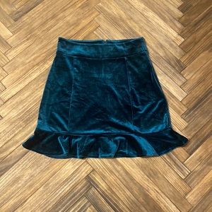 Women’s size: small forever 21 emerald green velvet skirt.